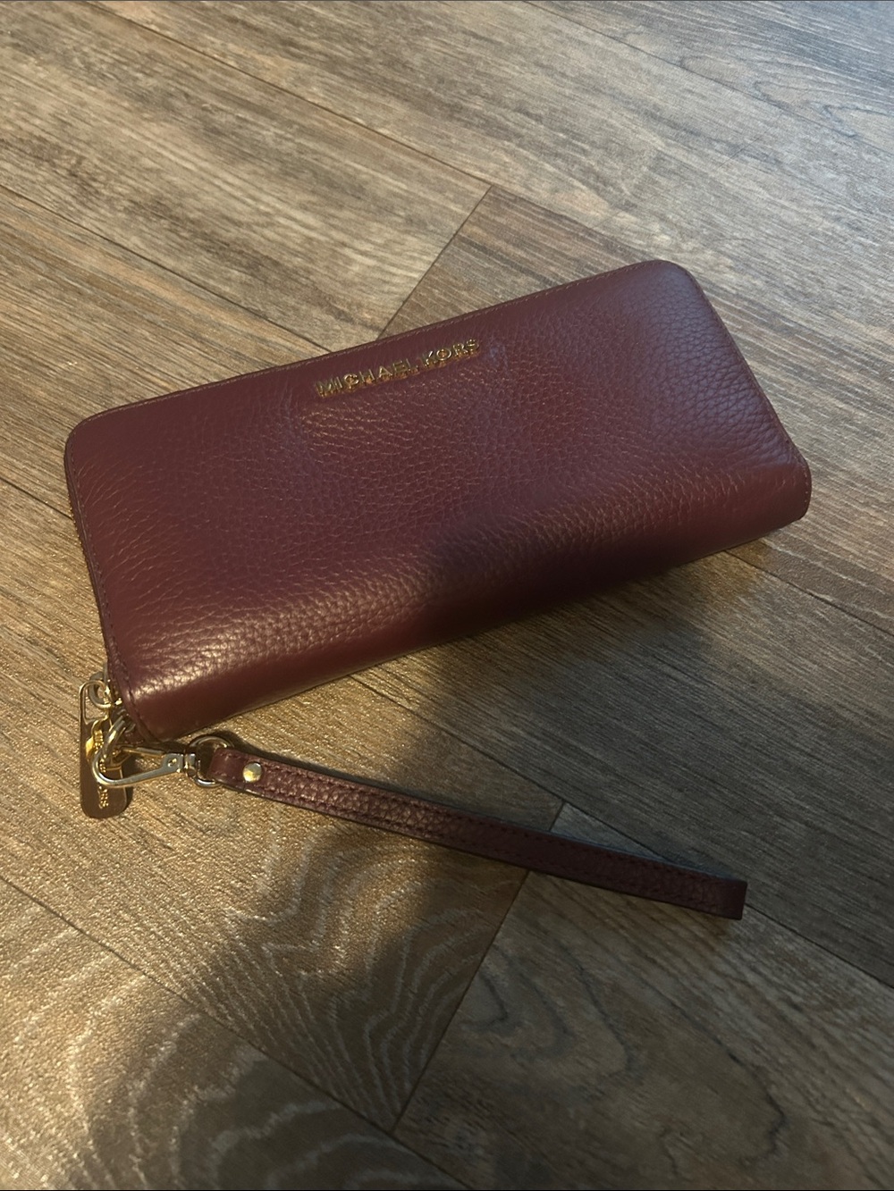 Michael Kors Wine Pebbled Leather Wristlet with Gold Hardware